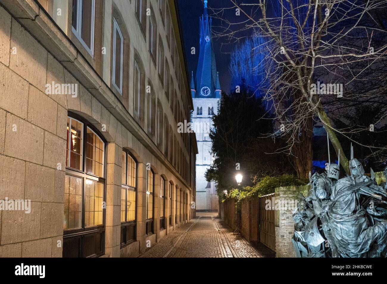 Müller-Schlösser-Gasse, city elevation monument and St.Lambertus church at night in the old town of Düsseldorf, NRW, Germany on 11.12.2021 Stock Photo