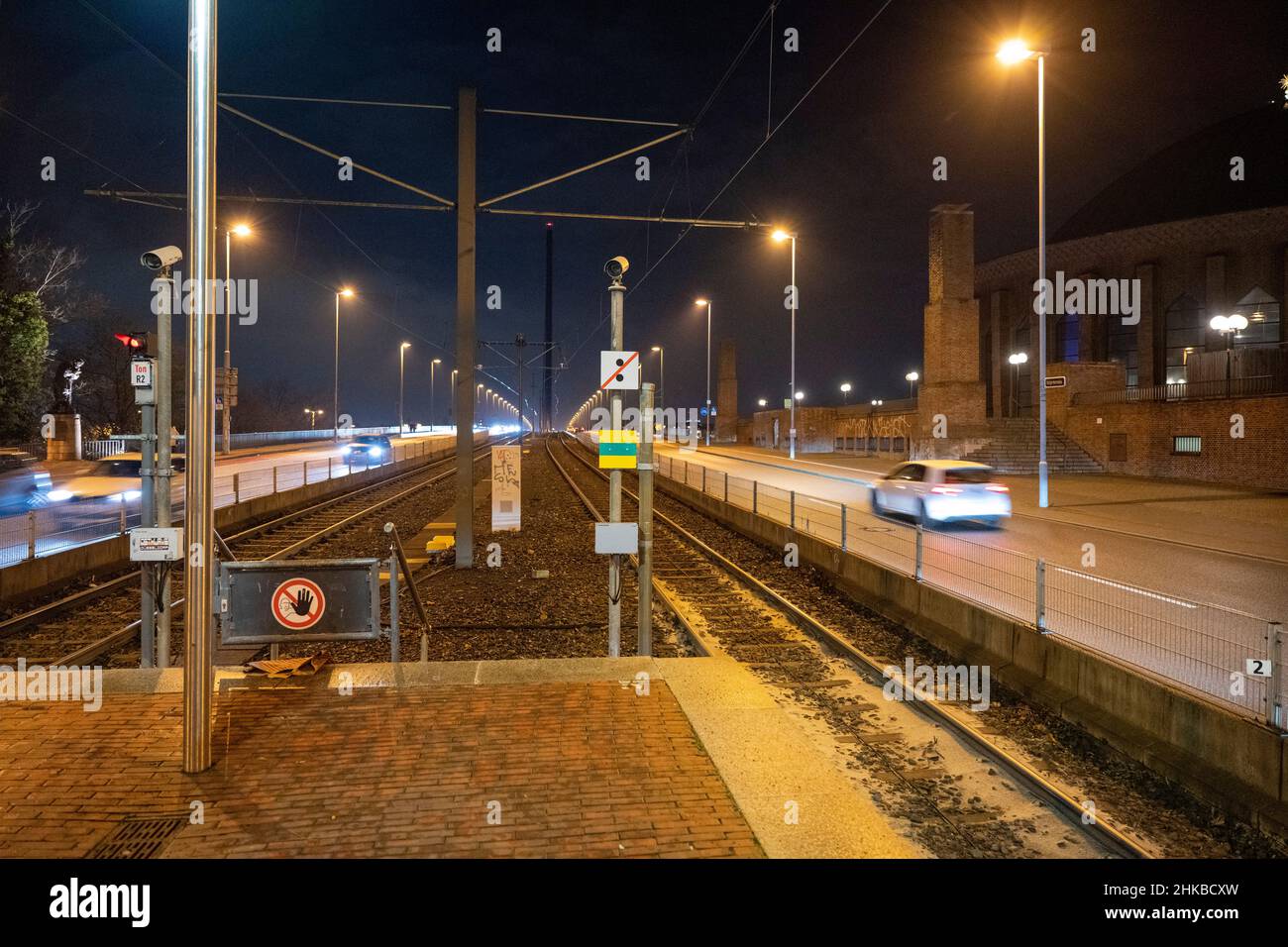 Tram stop 'Tonhalle' at the approach to the Oberkassel bridge at night in Düsseldorf, NRW, Germany on 11.12.2021 Stock Photo