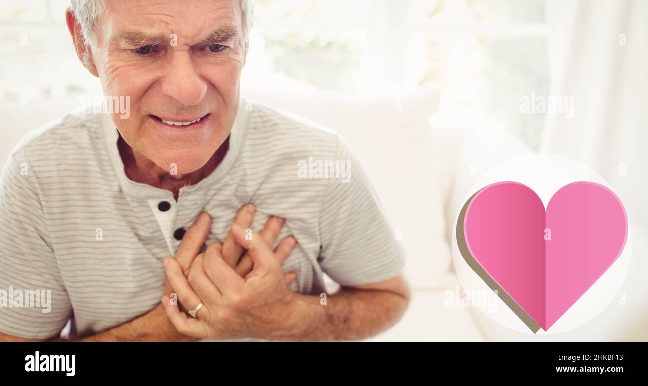 Close-up of caucasian senior man with hands on chest suffering from heart attack Stock Photo
