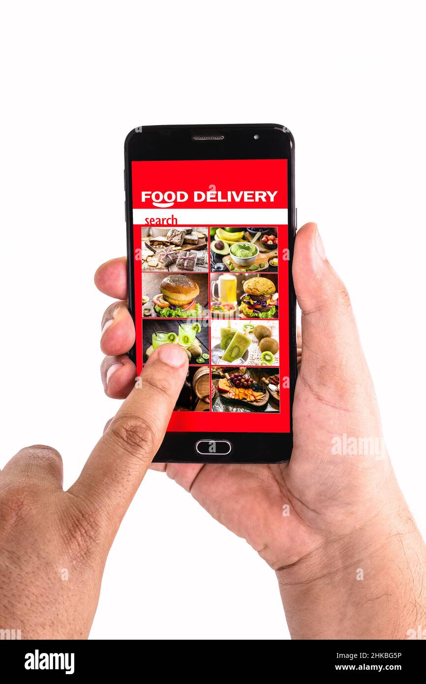hand clicking over smartphone cell phone screen ordering food via food ...