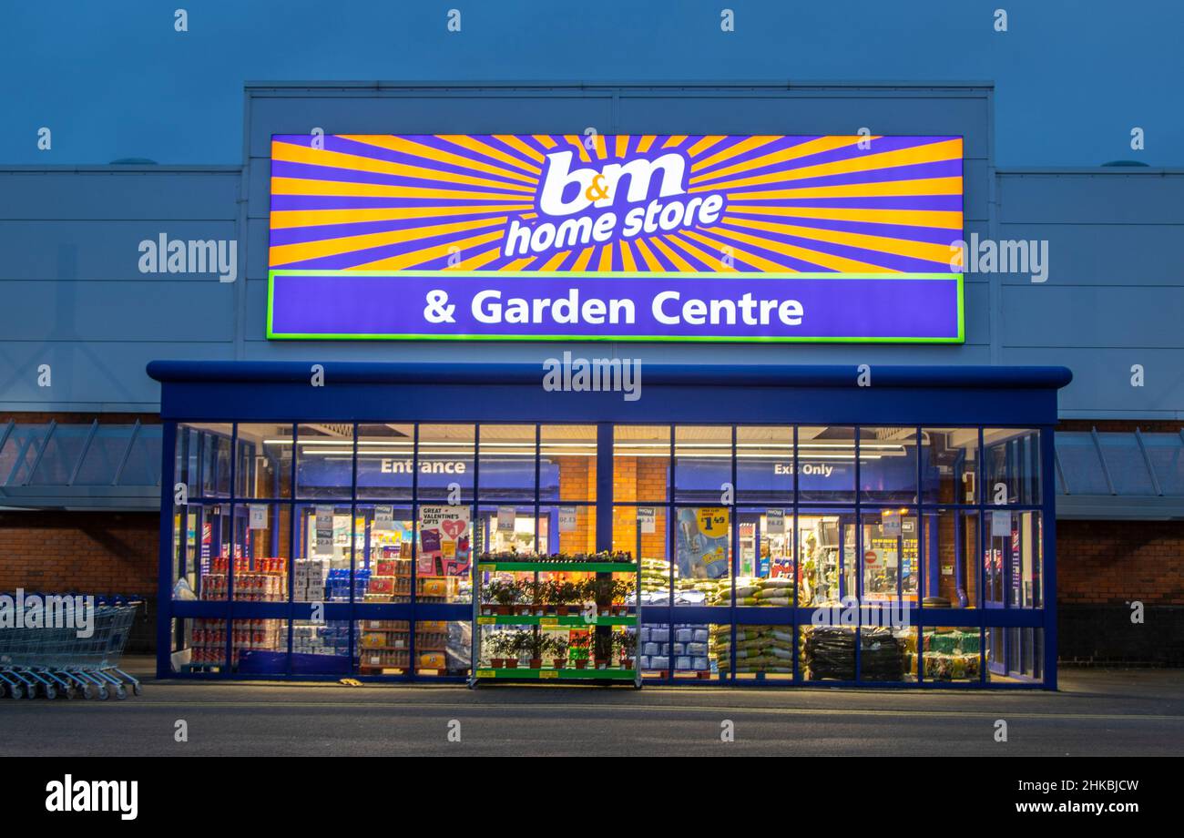 B&M BM B and M Home store and garden centre, illuminated store sign and entrance in Preston, UK Stock Photo
