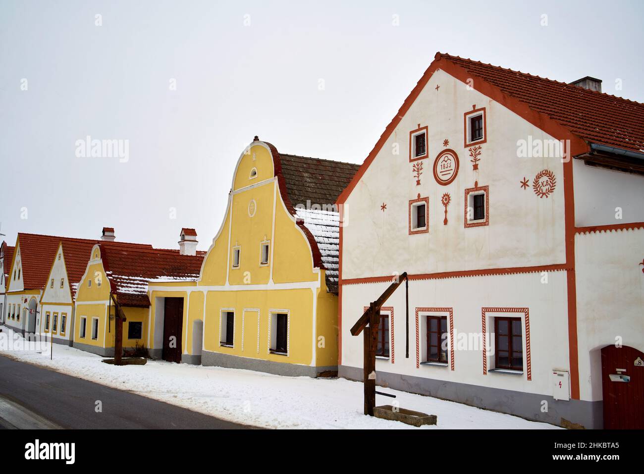 HOLASOVICE, CZECH REPUBLIC - JANUARY 21, 2022: Houses in rural baroque style in South Bohemia registered as UNESCO world heritage site Stock Photo