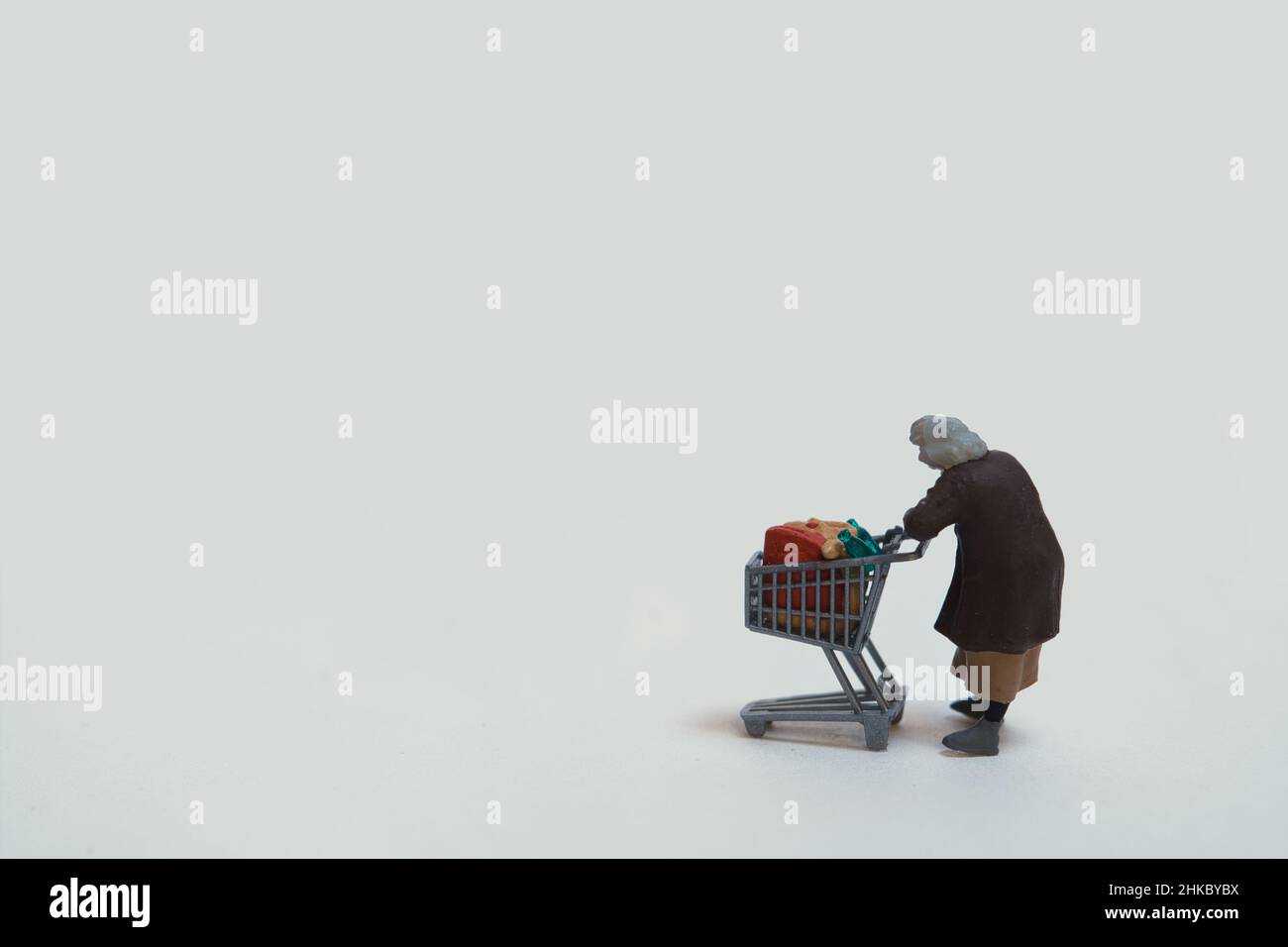 Old woman shopping trolley hi-res stock photography and images - Alamy