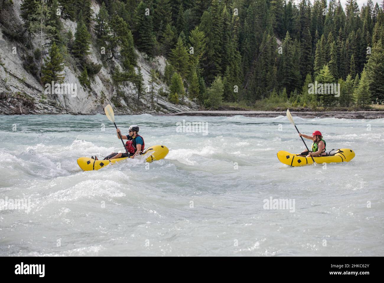Man and woman paddling in British Columbia, Canada. Stock Photo