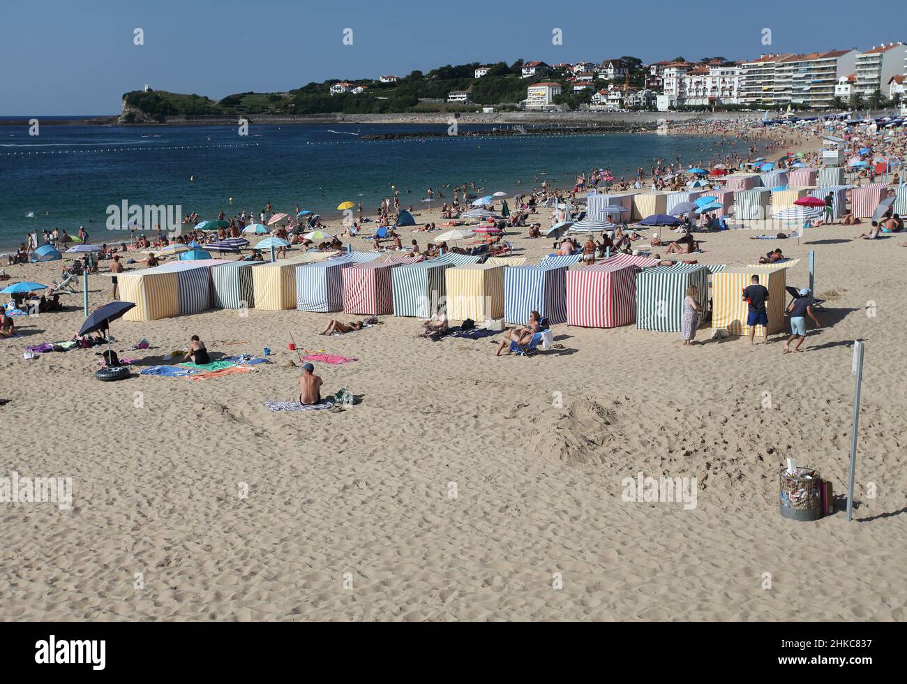 Colourful stripy bathing tents on the Grande Plage beach at St Jean de Luz,  Pays Basque, Pyrenees Atlantiques, France Stock Photo - Alamy