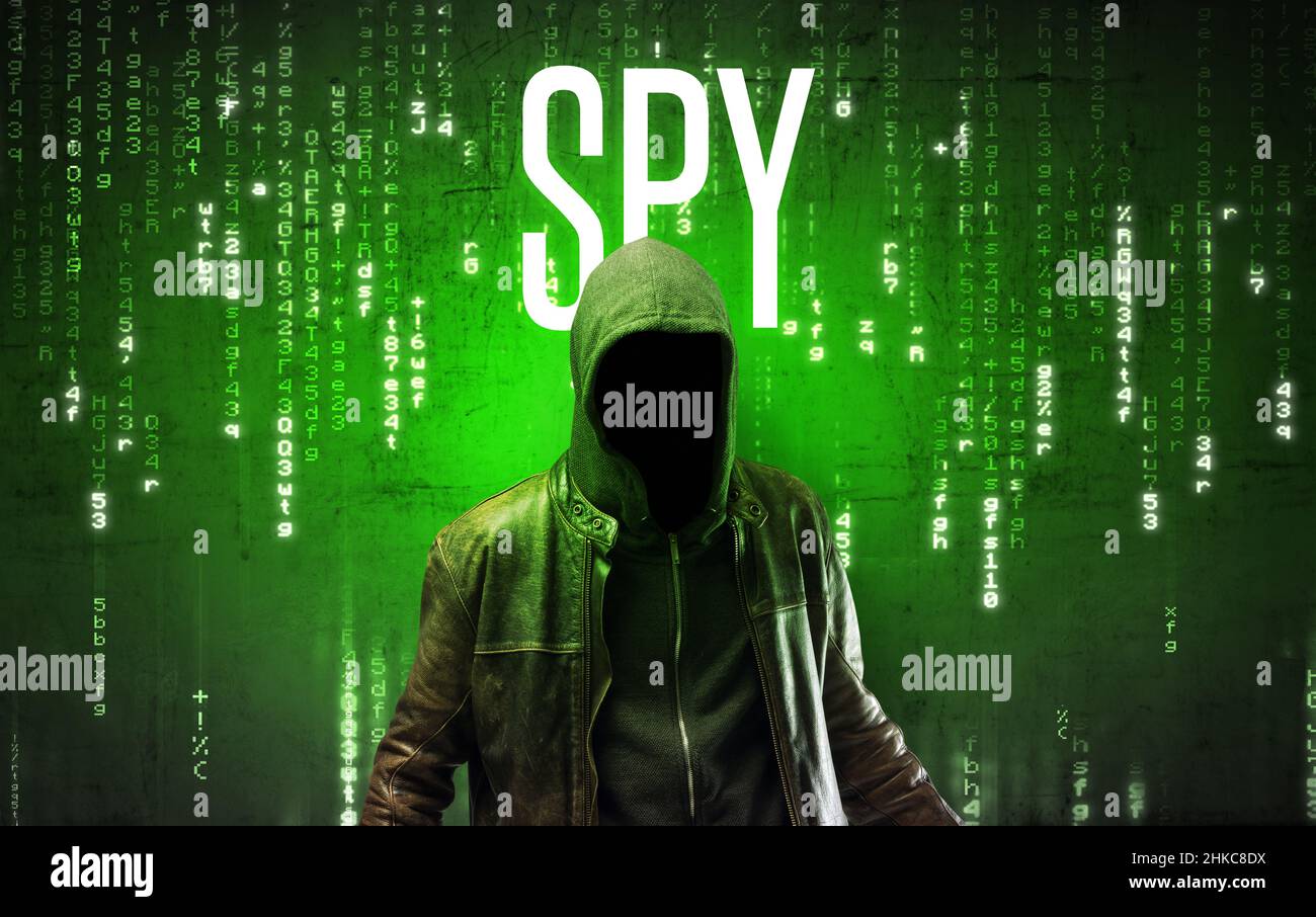 Faceless hacker with inscription Stock Photo