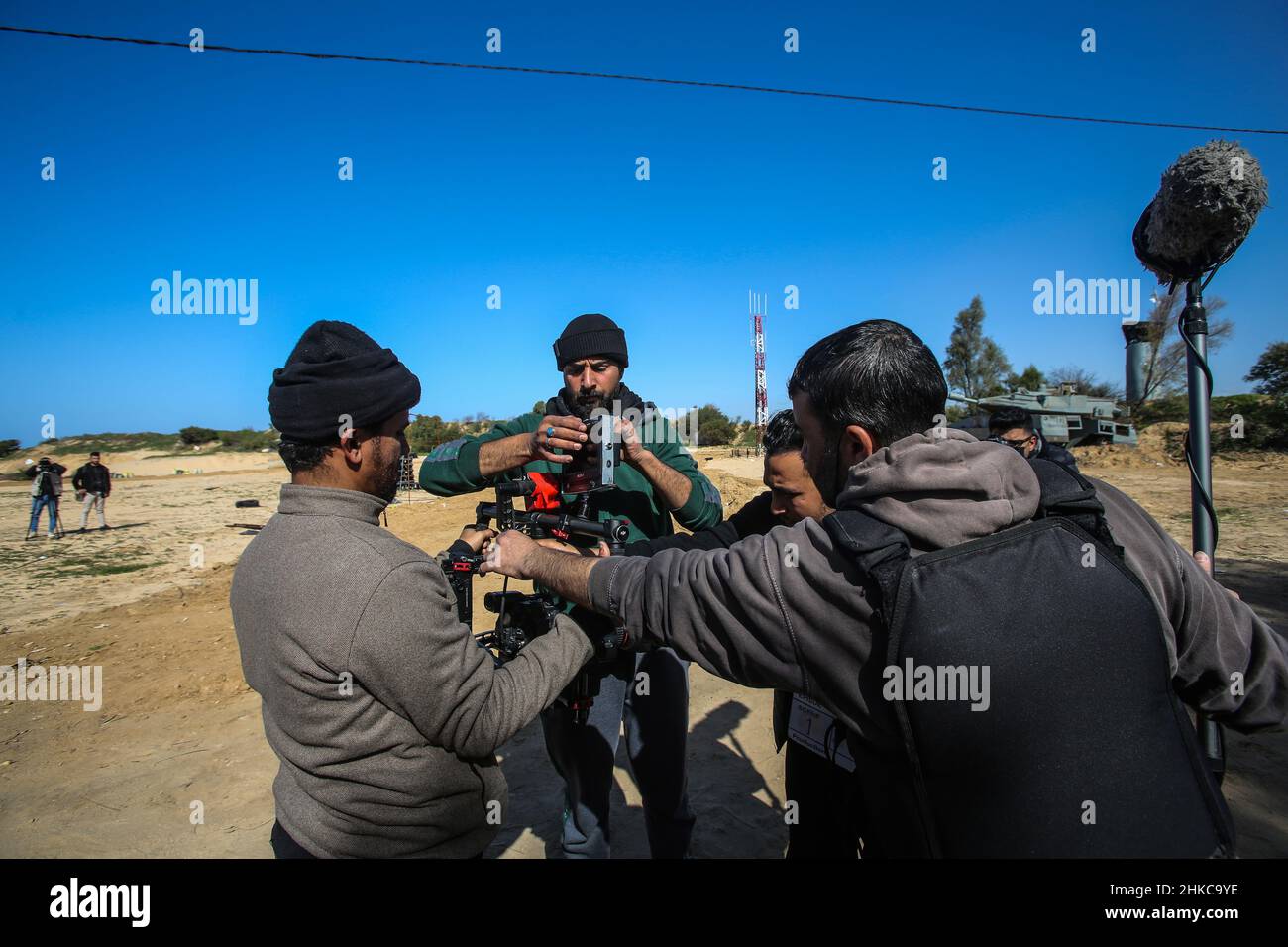 Palestinian crew prepare the camera during the shooting.A crew from Al-Aqsa TV shoots a