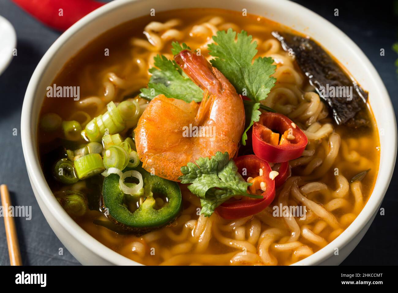 Instant Spicy Seafood Ramen with Shrimp and Peppers Stock Photo - Alamy