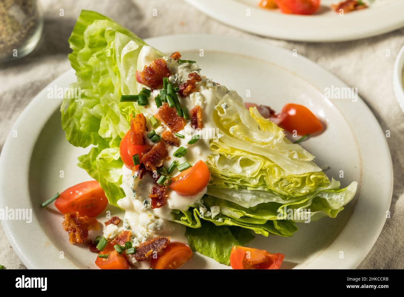 Homemade Healthy Iceberg Wedge Salad with Blue Cheese Dressing Stock