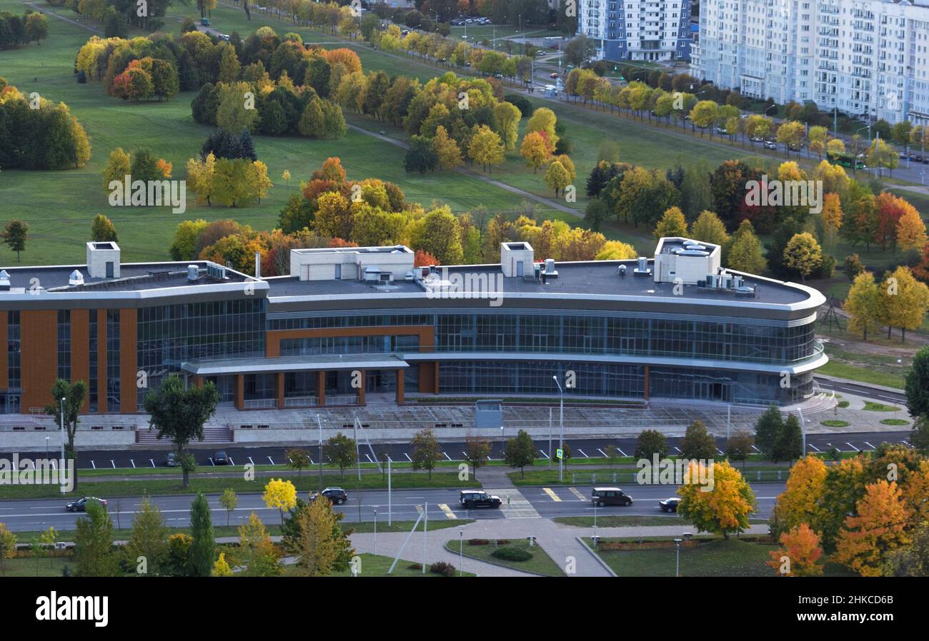 View from a height of the park area and modern buildings in Europe. Autumn time. Stock Photo