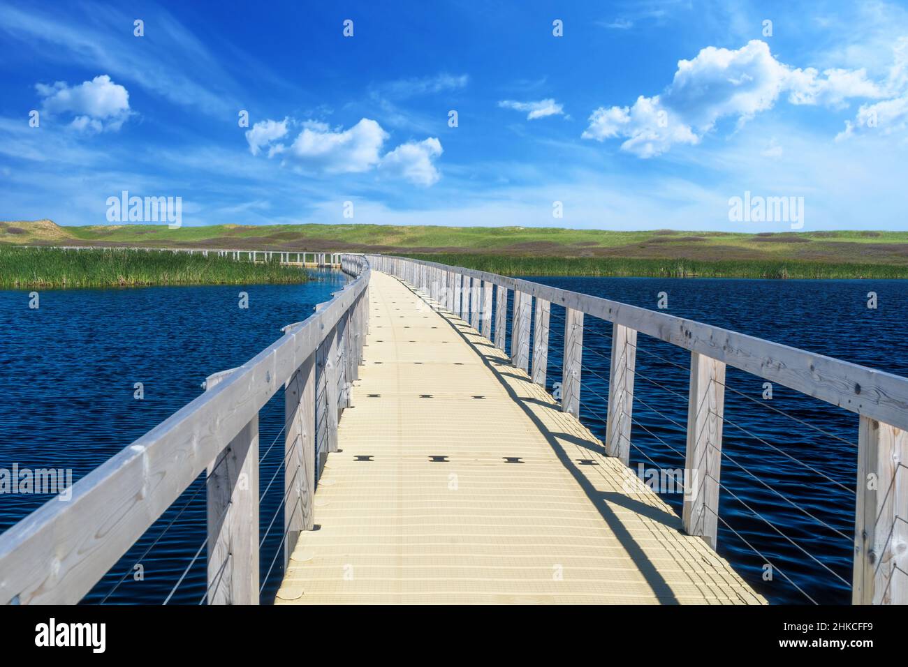 Floating boardwalk heading to the dunes in Prince Edward Island National Park, Canada. Stock Photo