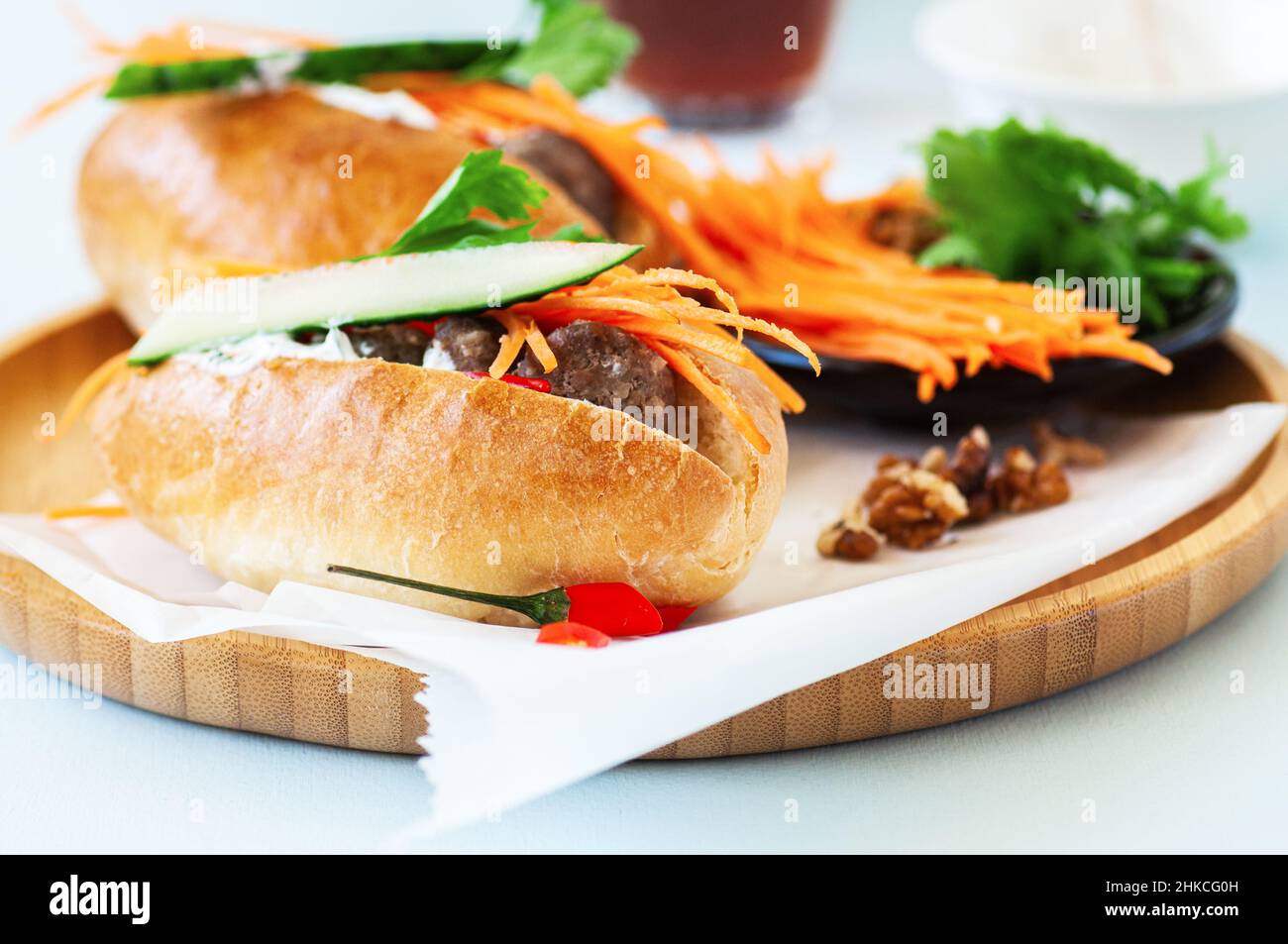 Homemade hotdogs with beef meatballs with vegetables. Close up. Stock Photo