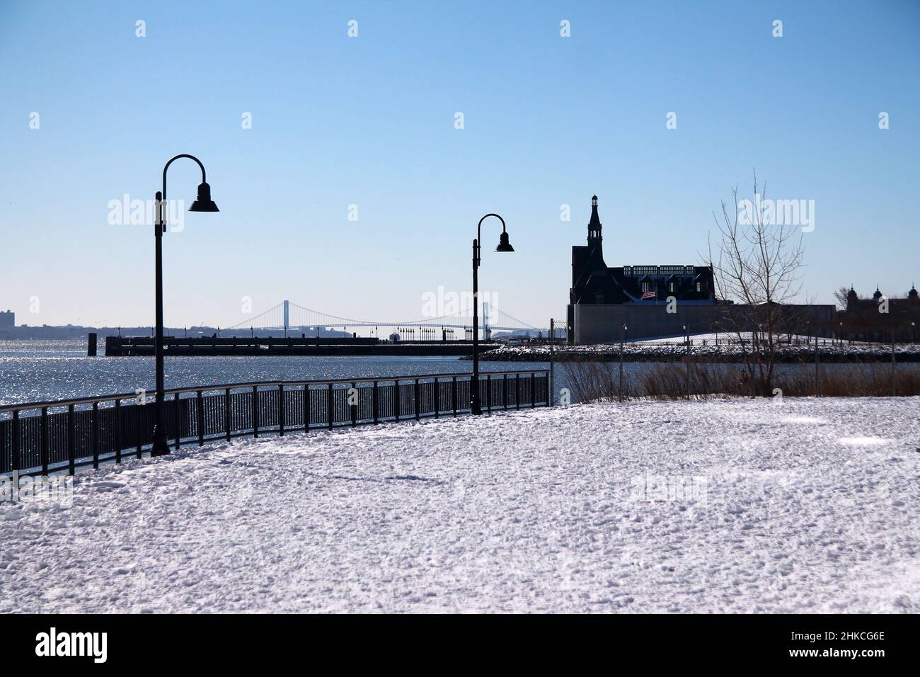 The Central Railroad of New Jersey Terminal and Verrazzano bridge with the snow in a winter day from Jersey City Stock Photo