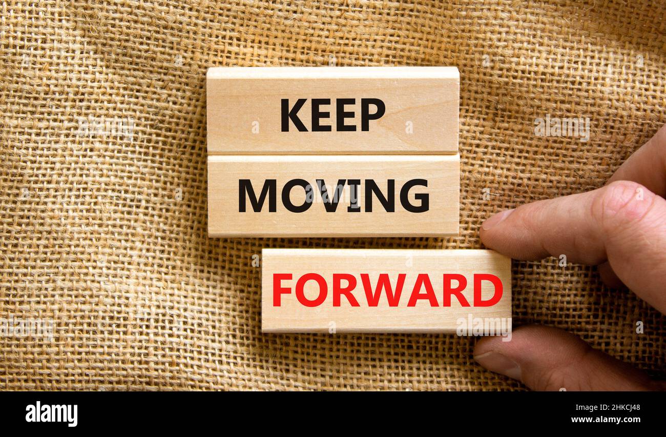 Keep moving forward symbol. Concept words Keep moving forward on blocks