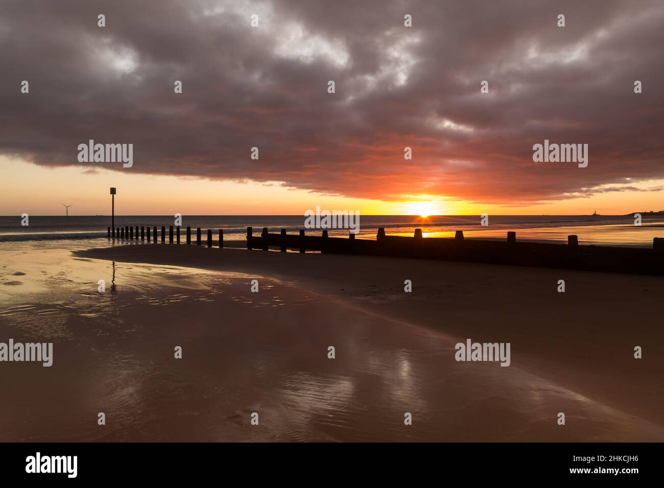 Sunrise to start the day at Blyth beach in Northumberland, with St Mary