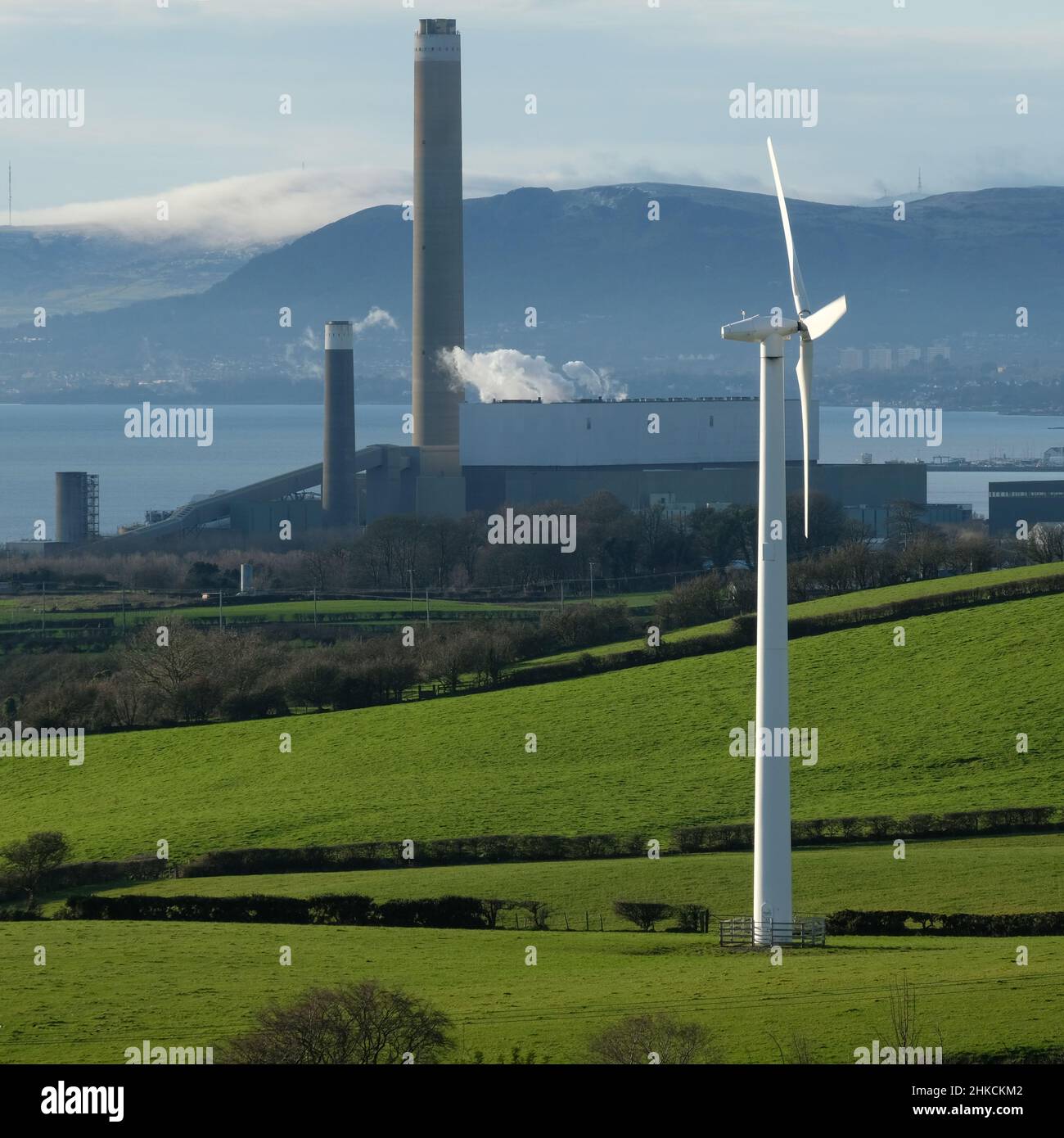 Kilroot Power station, wind turbine & Cavehill, County Antrim Stock Photo