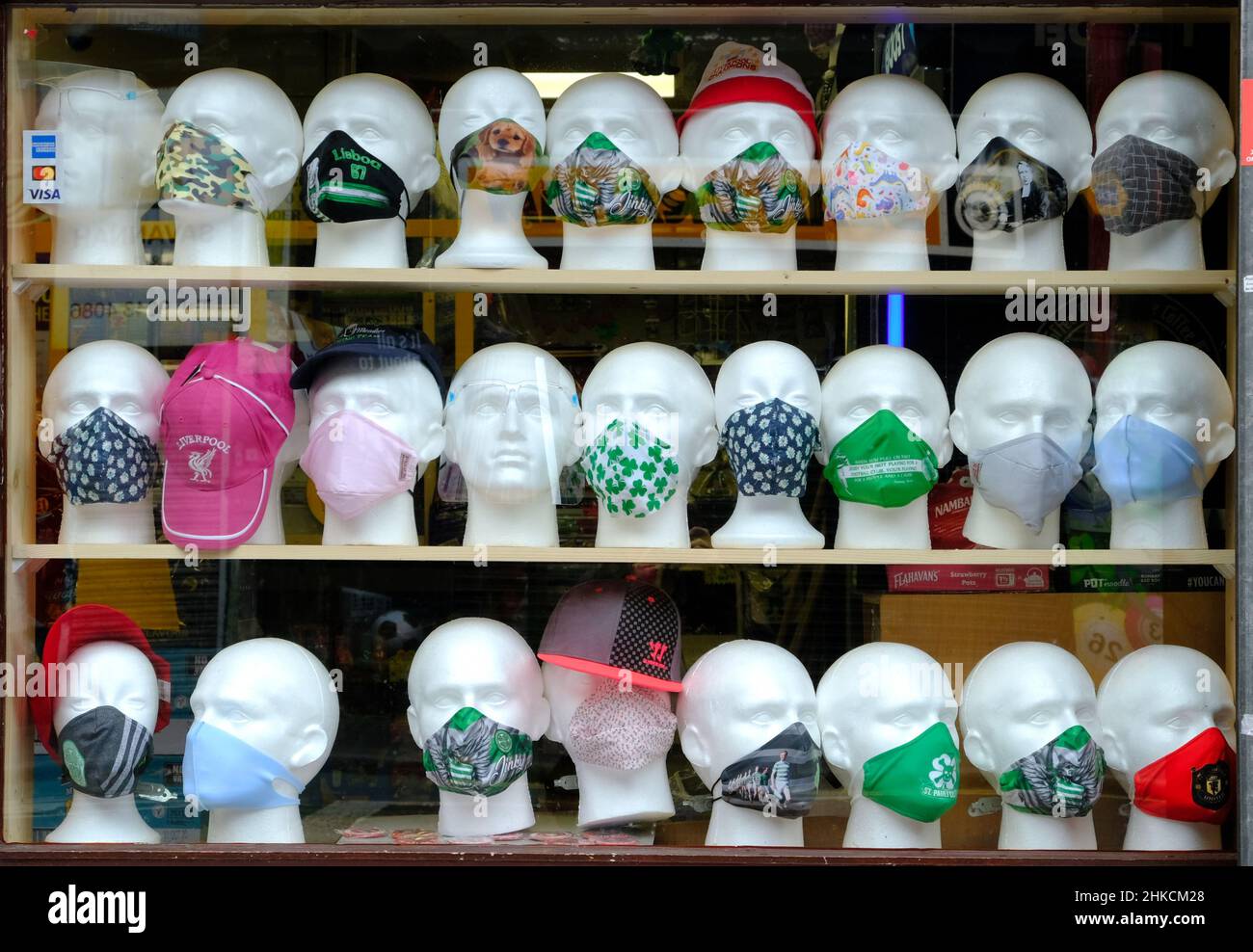 Window displaying face masks of various designs, Castle St. Belfast. Stock Photo