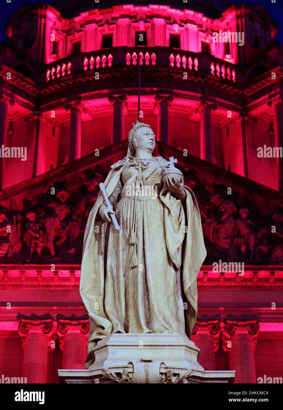 Statue of Queen Victoria at Belfast City Hall, (lit for Gay Pride). Stock Photo