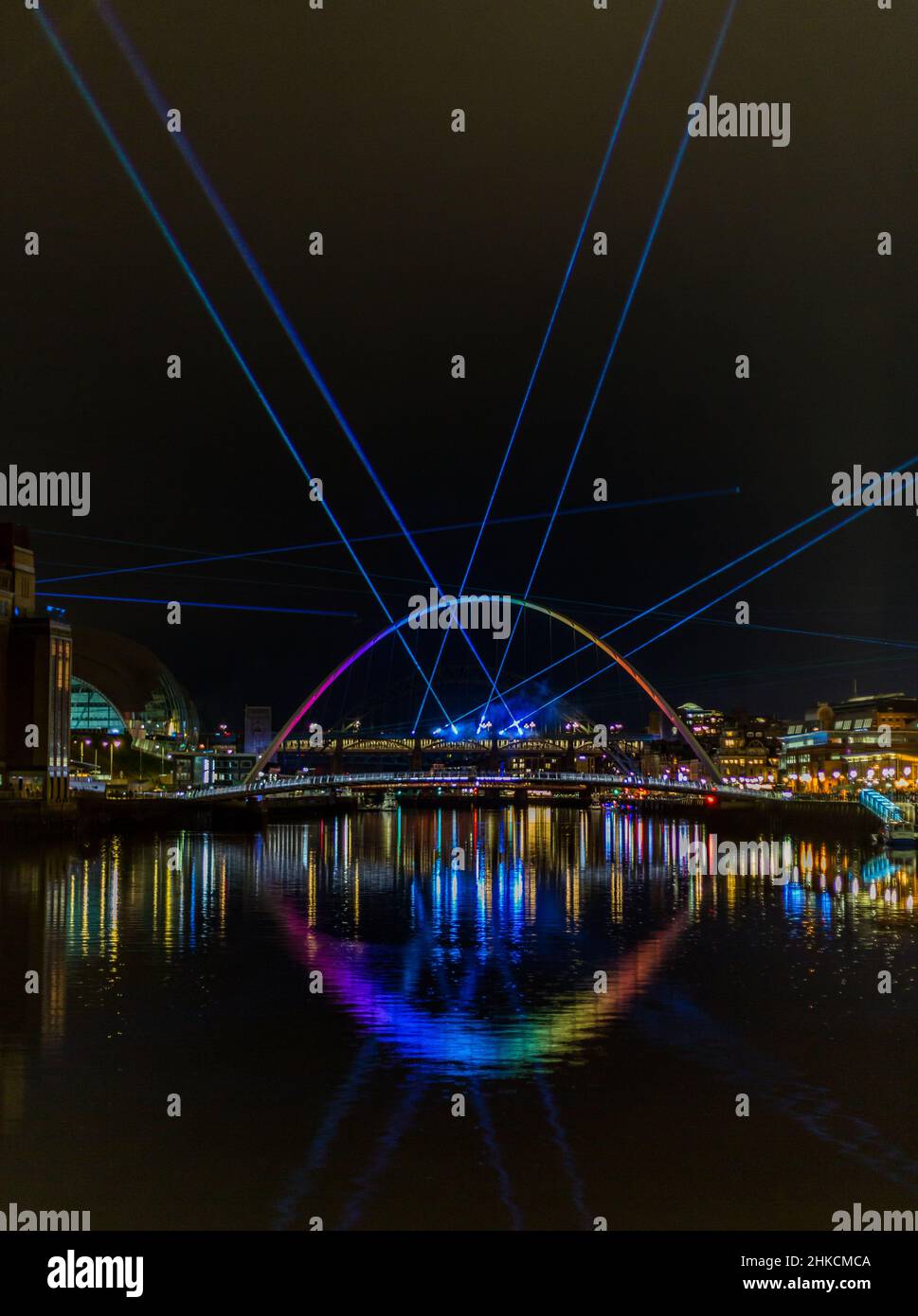 To bring in New Year's Eve in Newcastle, there was a laser show in the city, with the laser beams visible in the River Tyne Stock Photo
