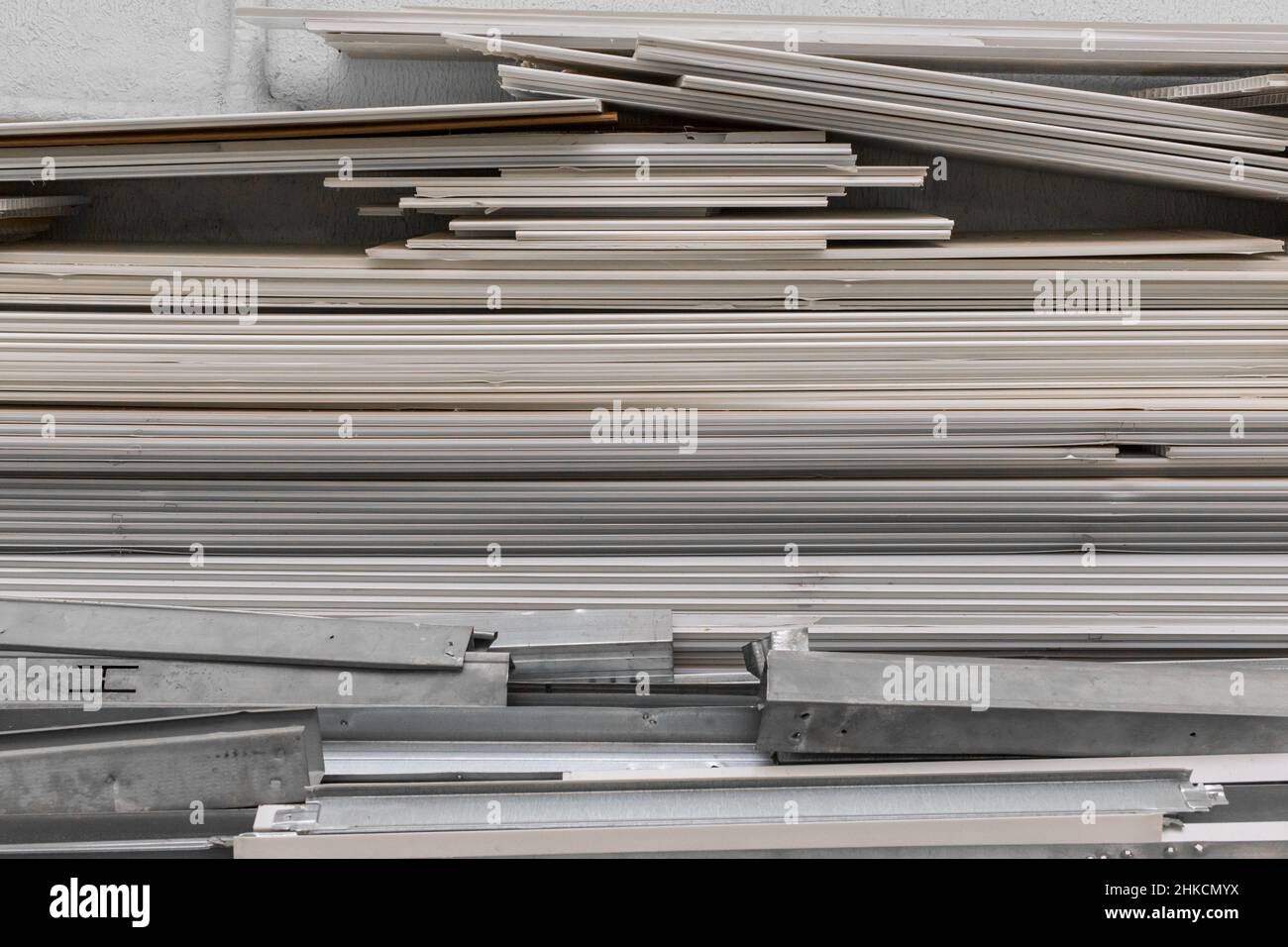 Old PVC plastic panels in a pile of building used recycling