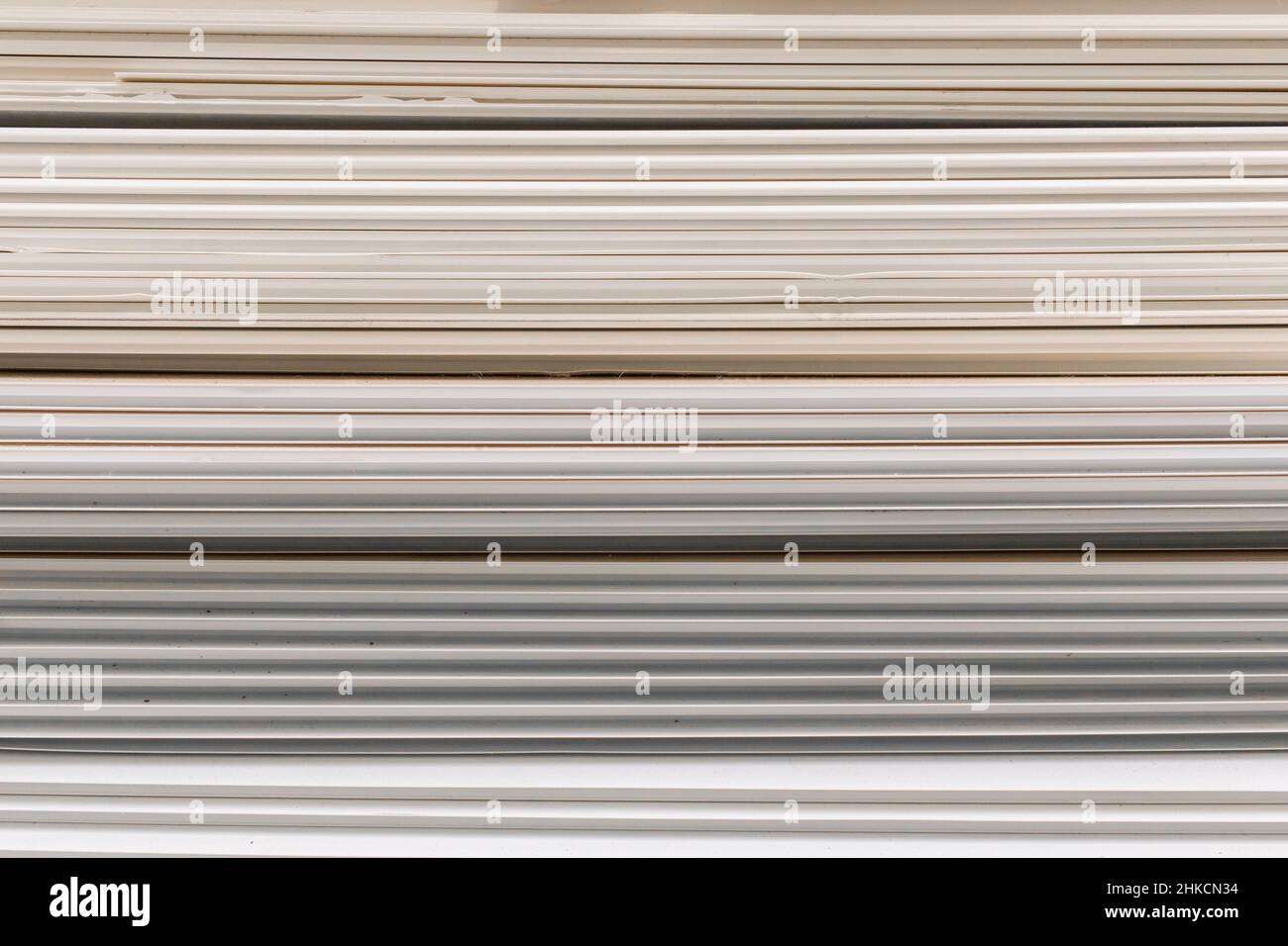 Old PVC plastic panels in a pile of building used recycling