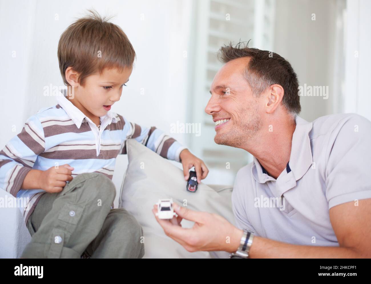 Play time with Dad. Portrait of a happy father playing with his son. Stock Photo