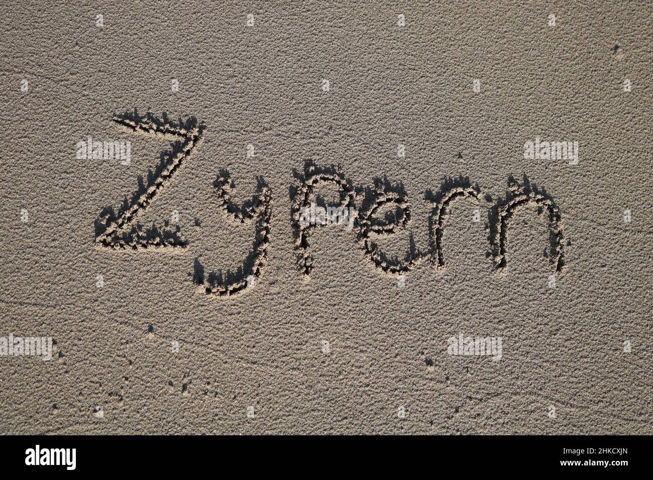 The Word 'Zypern' written in the sand in Cyprus Stock Photo