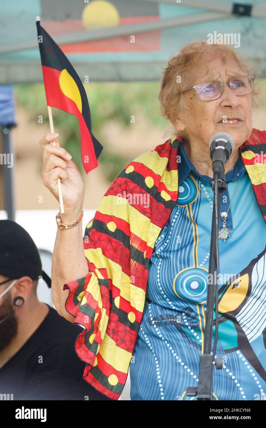 Aboriginal elder Auntie Glenys speaks to the protesters at Queens Gardens.Protesters took to the streets of Brisbane, Queensland, Australia on the 26th January, the Australia Day (often referred to as Invasion Day): a date synonymous with the beginning of the persecution of Aboriginal people to call for action on important issues for First Nations people and for proper recognition of crimes historically perpetrated against them. Several elders spoke at Queens Gardens before the crowd marched through the city and over the bridge to Musgrave Park in South Brisbane. Stock Photo