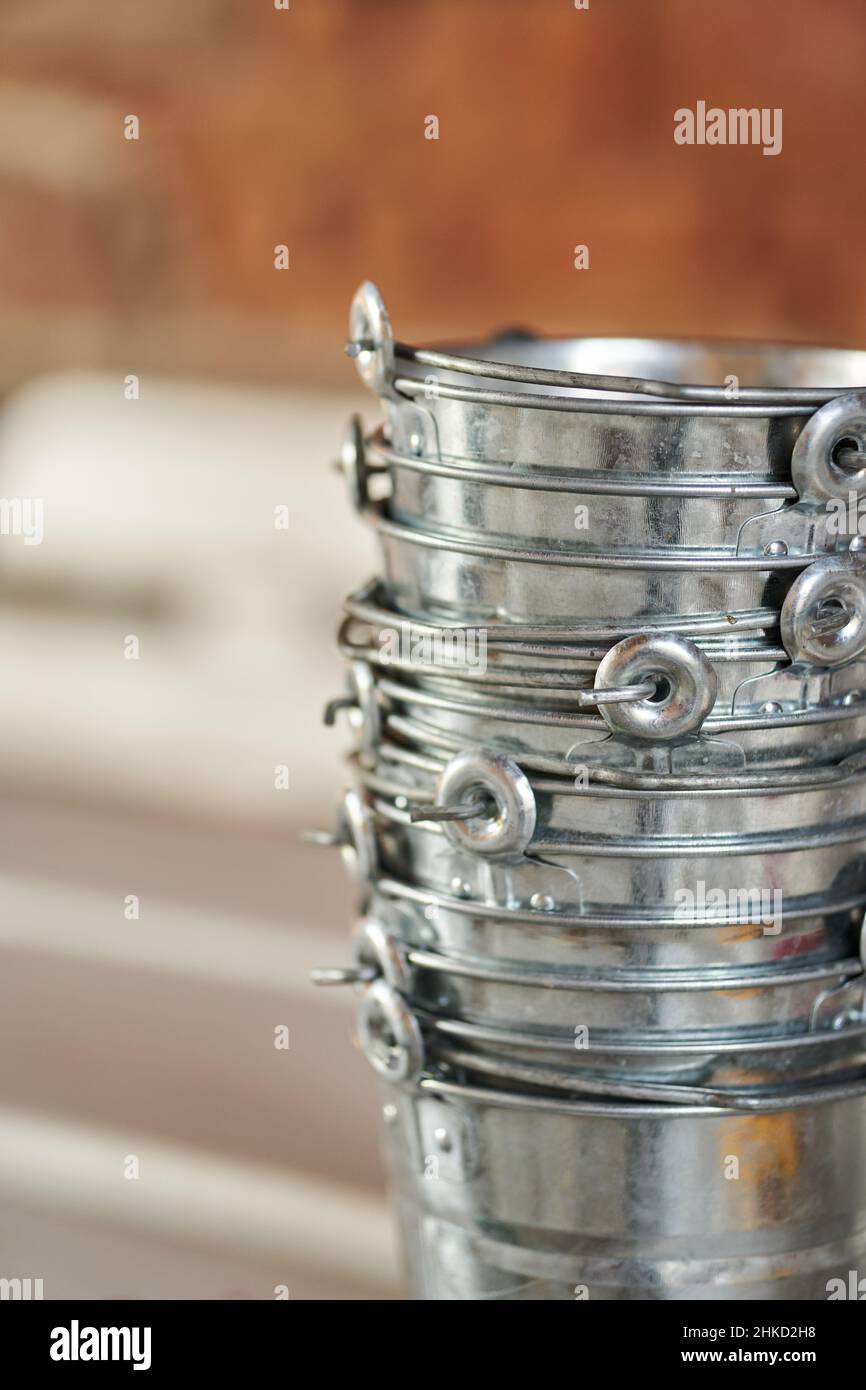 Stack of metal buckets Stock Photo - Alamy