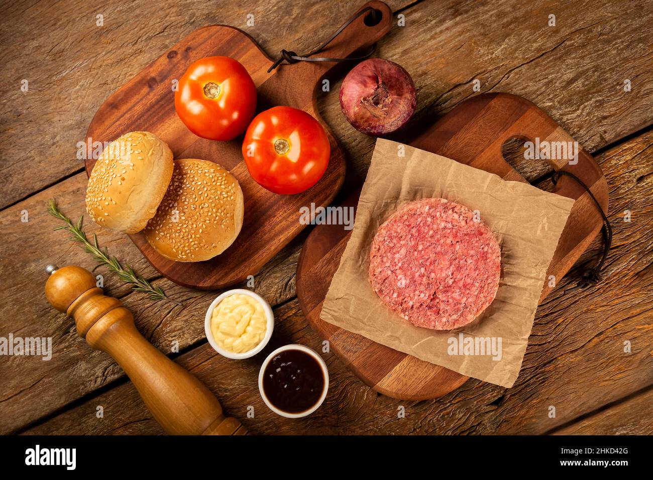Table with ingredients for hamburger. Raw hamburger Stock Photo Alamy