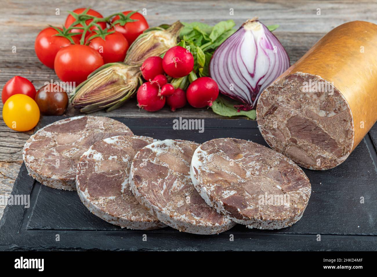 Turkish style meat roll. Lokal name; Baton Kavurma. Turkish roasted meat ( kavurma ). Eid al-Adha concept. 'Winter' kavurma is a Turkic sheep meat dis Stock Photo