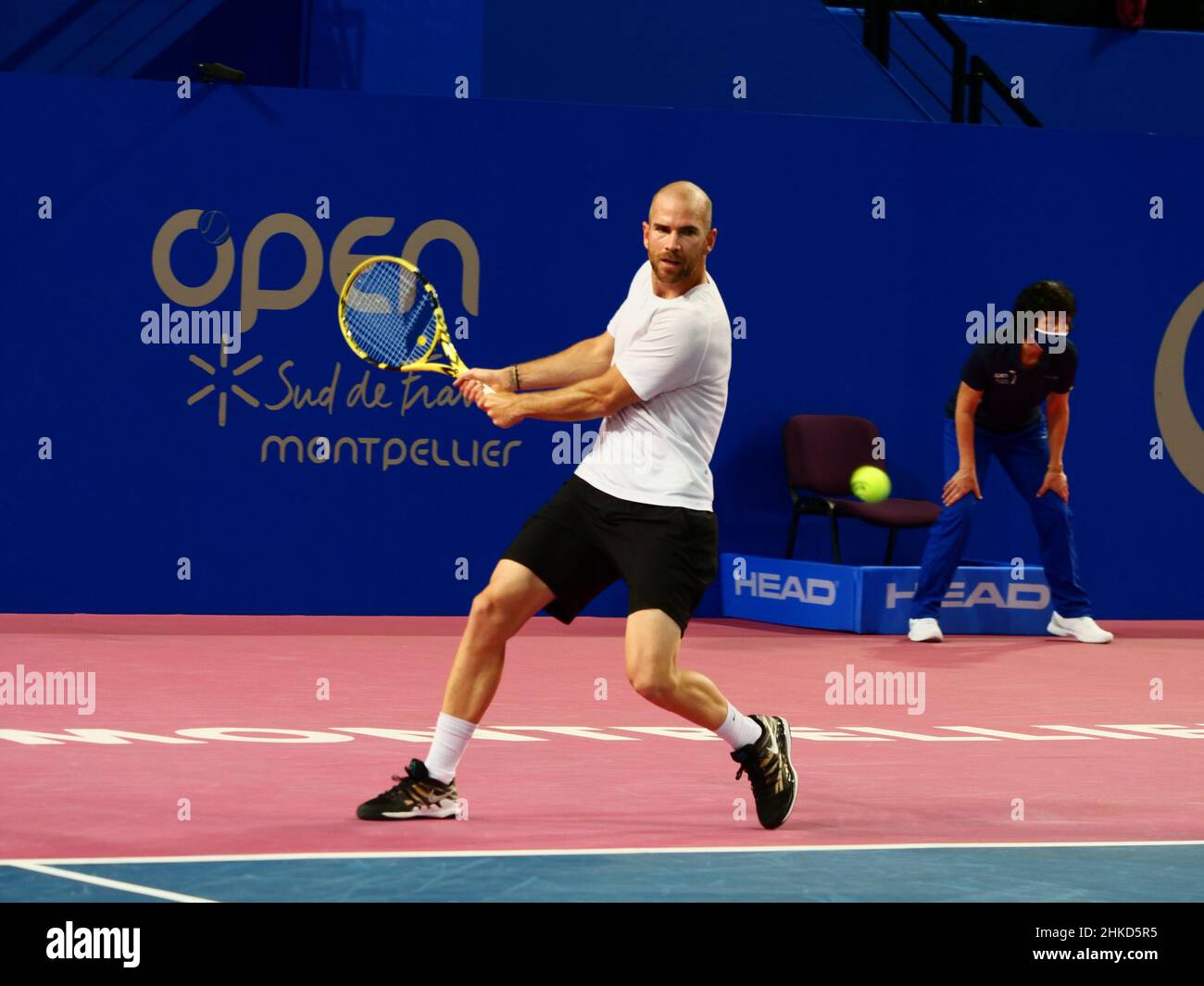 Adrian Mannarino of France in action against David Goffin of Belgium during the Open Sud de, France