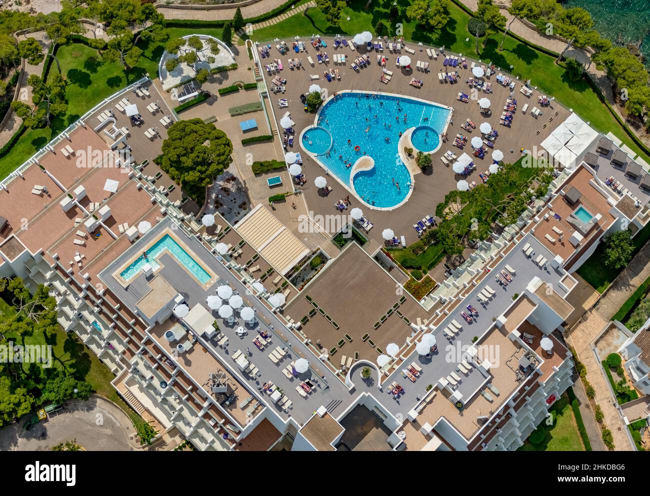 Aerial view, swimming pool on the roof Aparthotel Ponent Mar, Palmanova, Calvià, Mallorca, Balearic Islands, Spain, bathers, seaside resort, ES, Europ Stock Photo