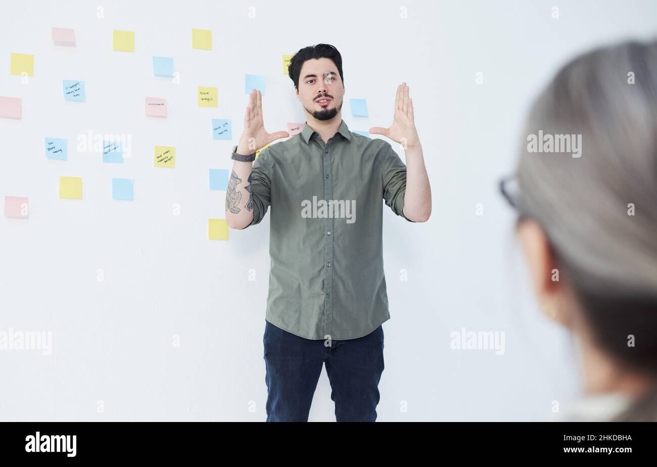 Man men male adult adults explaining hi-res stock photography and ...