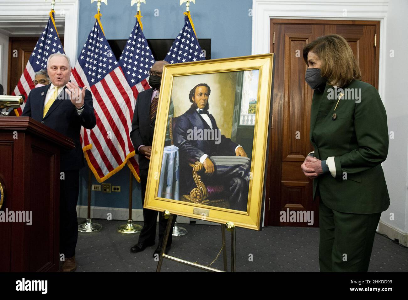 Washington, United States. 03rd Feb, 2022. United States Speaker of the House Nancy Pelosi (R) looks on as Republican Representative of Louisiana Steve Scalise (L) speaks beside a portrait of Joseph H. Rainey, during an unveiling ceremony for the Joseph H. Rainey Room, on Capitol Hill in Washington, DC, on Thursday, February 3, 2022. Rainey was the first black person to serve in the United States House of Representatives. Pool Photo by Michael Reynolds/UPI Credit: UPI/Alamy Live News Stock Photo