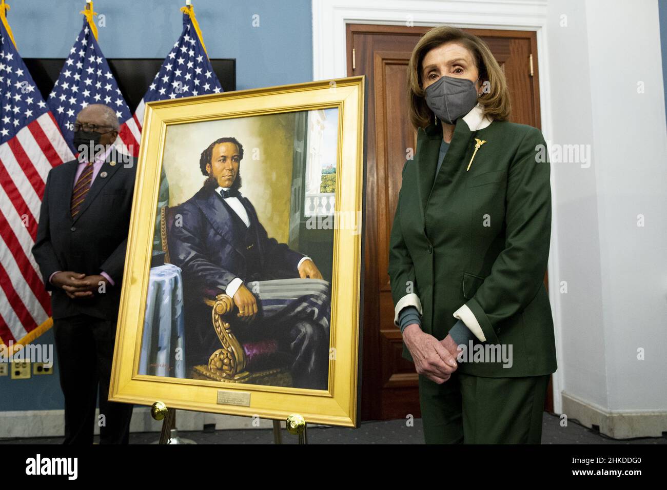 Washington, United States. 03rd Feb, 2022. United States Speaker of the House Nancy Pelosi (R) stands beside a portrait of Joseph H. Rainey, as Democratic Representative from South Carolina James Clyburn (Back) look on during an unveiling ceremony for the Joseph H. Rainey Room, on Capitol Hill in Washington, DC, on Thursday, February 3, 2022. Rainey was the first black person to serve in the United States House of Representatives. Pool Photo by Michael Reynolds/UPI Credit: UPI/Alamy Live News Stock Photo