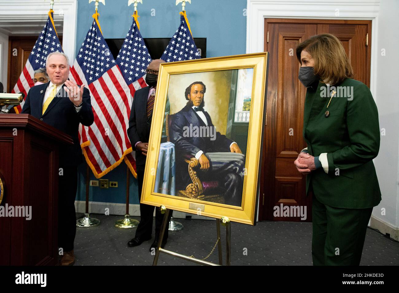 Washington, USA. 03rd Feb, 2022. United States Speaker of the House Nancy Pelosi (R) looks on as Republican Representative of Louisiana Steve Scalise (L) speaks beside a portrait of Joseph H. Rainey, during an unveiling ceremony for the Joseph H. Rainey Room, on Capitol Hill in Washington, DC, USA, 03 February 2022. Rainey was the first black person to serve in the United States House of Representatives. (Photo by Pool/Sipa USA) Credit: Sipa USA/Alamy Live News Stock Photo