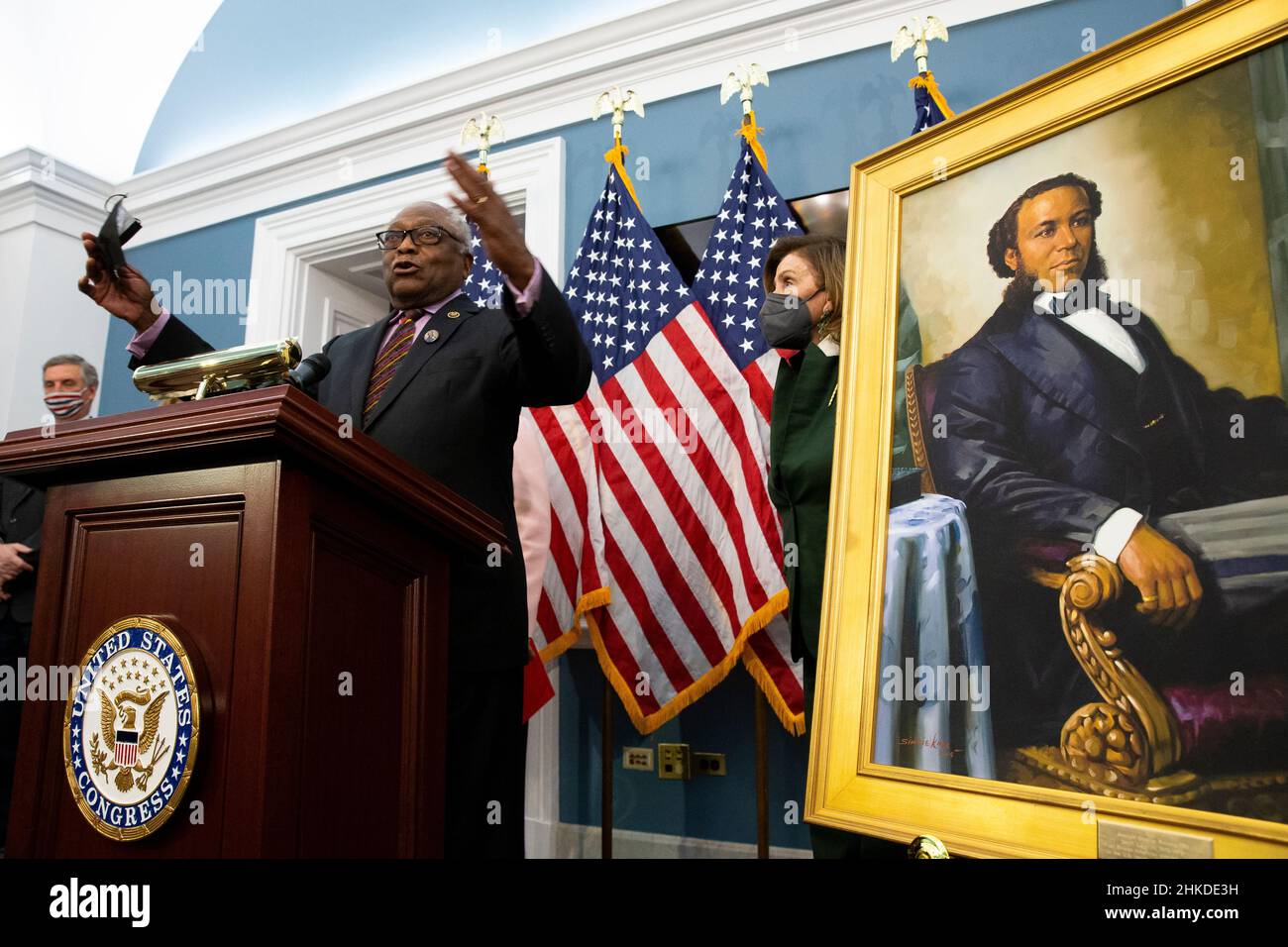 Washington, USA. 03rd Feb, 2022. United States Speaker of the House Nancy Pelosi (R) stands beside a portrait of Joseph H. Rainey, as Democratic Representative from South Carolina James Clyburn (L) speaks during an unveiling ceremony for the Joseph H. Rainey Room, on Capitol Hill in Washington, DC, USA, 03 February 2022. Rainey was the first black person to serve in the United States House of Representatives. (Photo by Pool/Sipa USA) Credit: Sipa USA/Alamy Live News Stock Photo