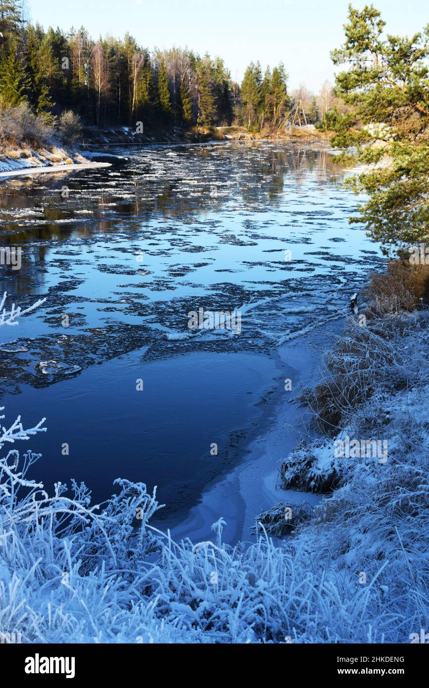 Winter landscape with a river and trees Stock Photo - Alamy