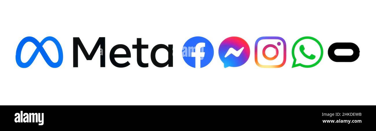 Kiev, Ukraine - October 29, 2021: Meta logo and icons of its products: Facebook, Messenger, Instagram, WhatsApp and Oculos, printed on white paper. So Stock Photo