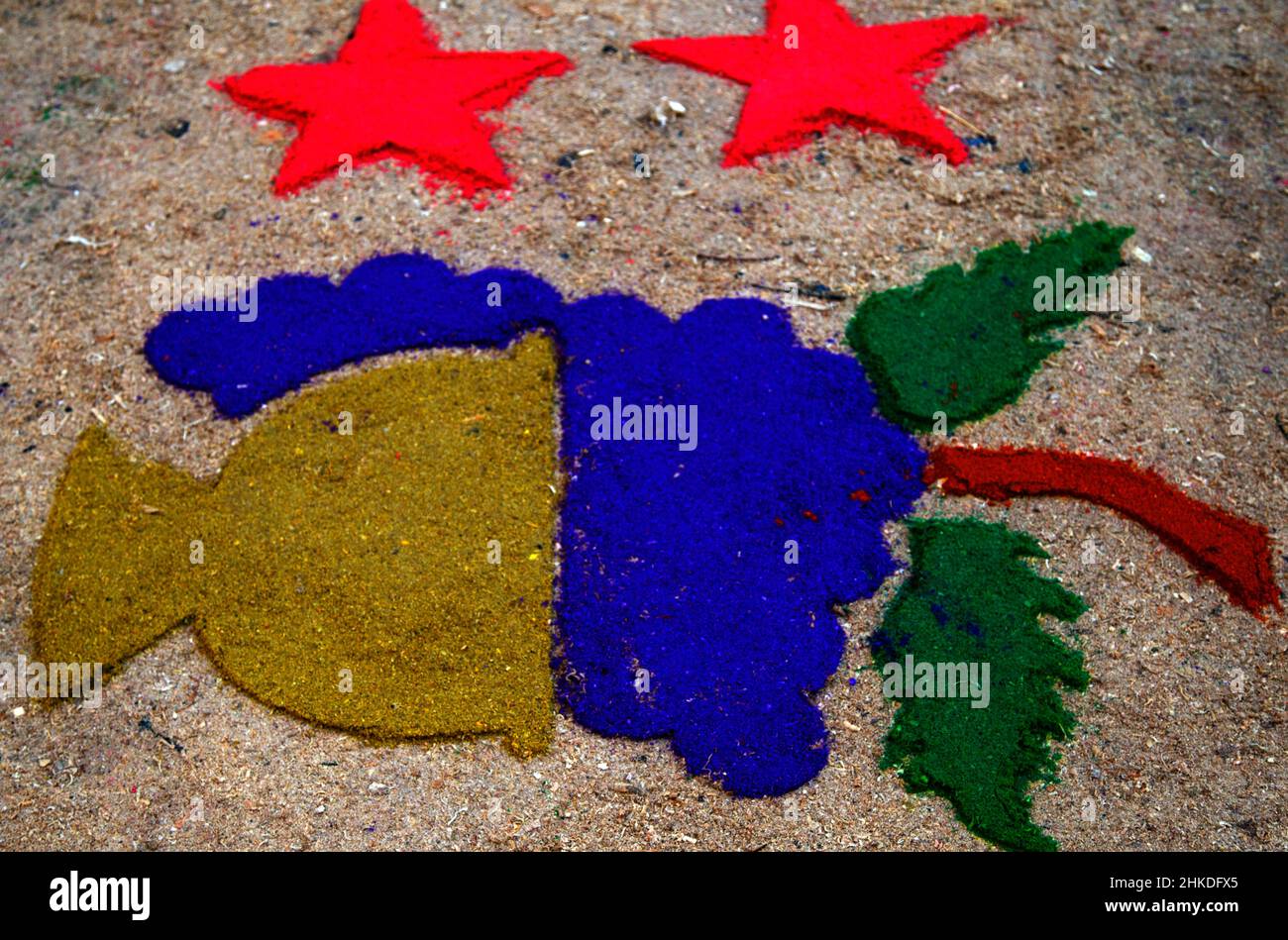 Street screen of locally made alfombra, sawdust carpets with colorful