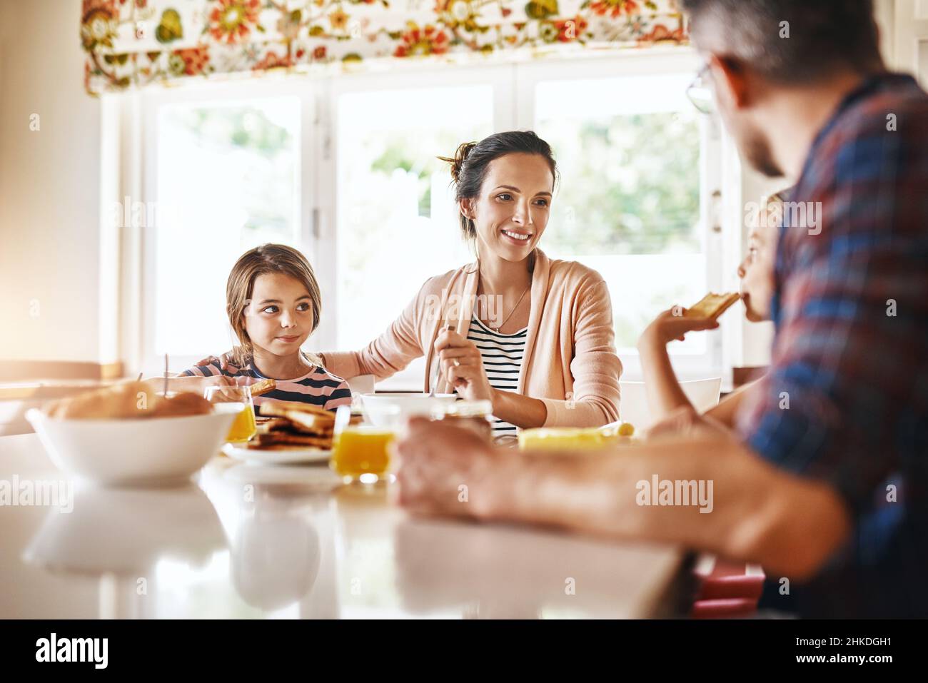 She makes sure that everyone has something to eat Stock Photo