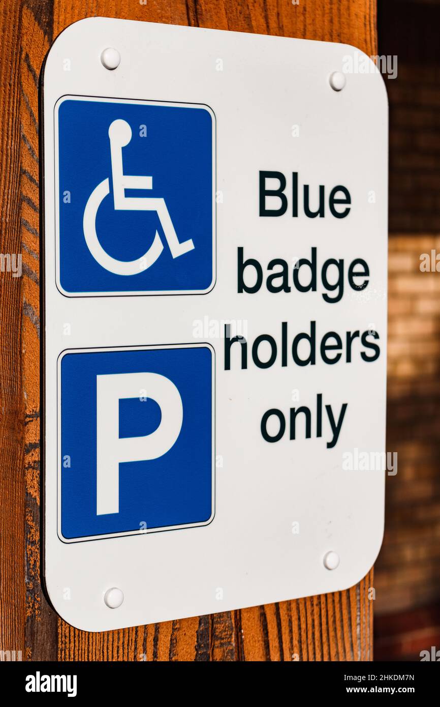 Blue badge sign. Disabled parking space sign Stock Photo Alamy
