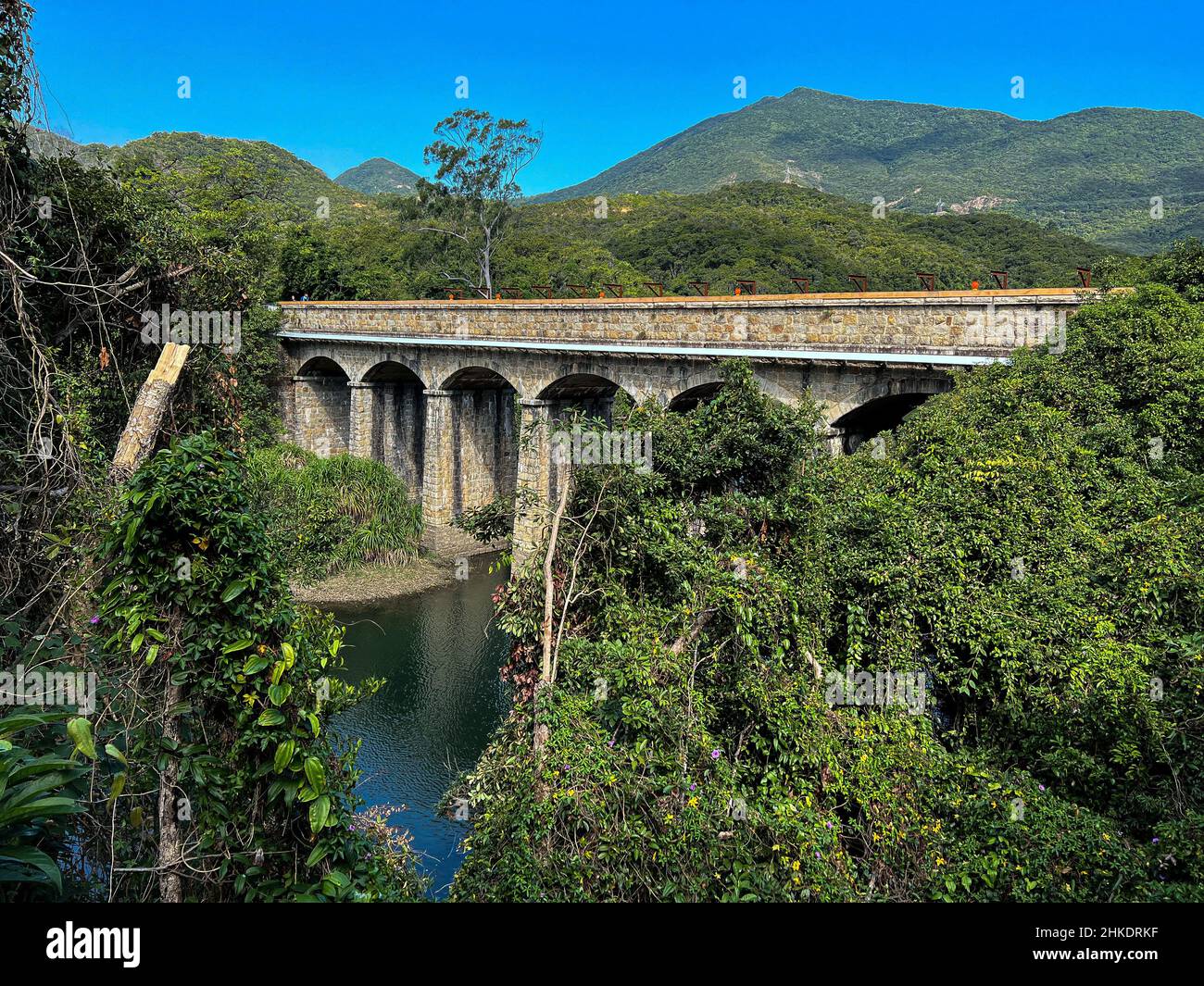 View of a bridge in the Tai Tam Intermediate Reservoir in Hong Kong Stock Photo