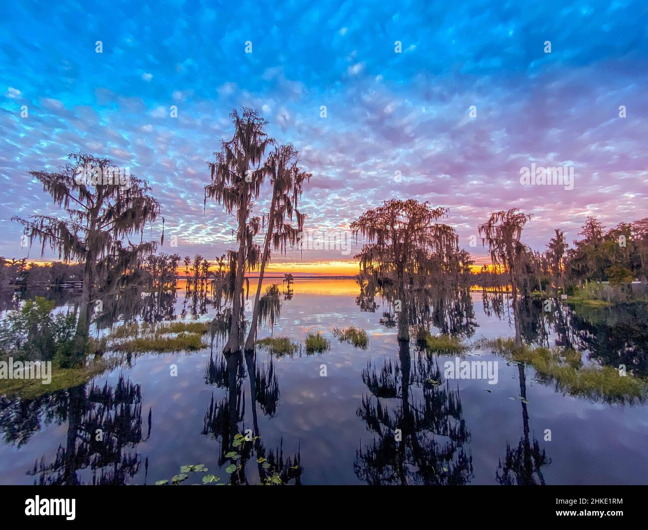 Sunset clouds hanging over lake hi-res stock photography and images - Alamy