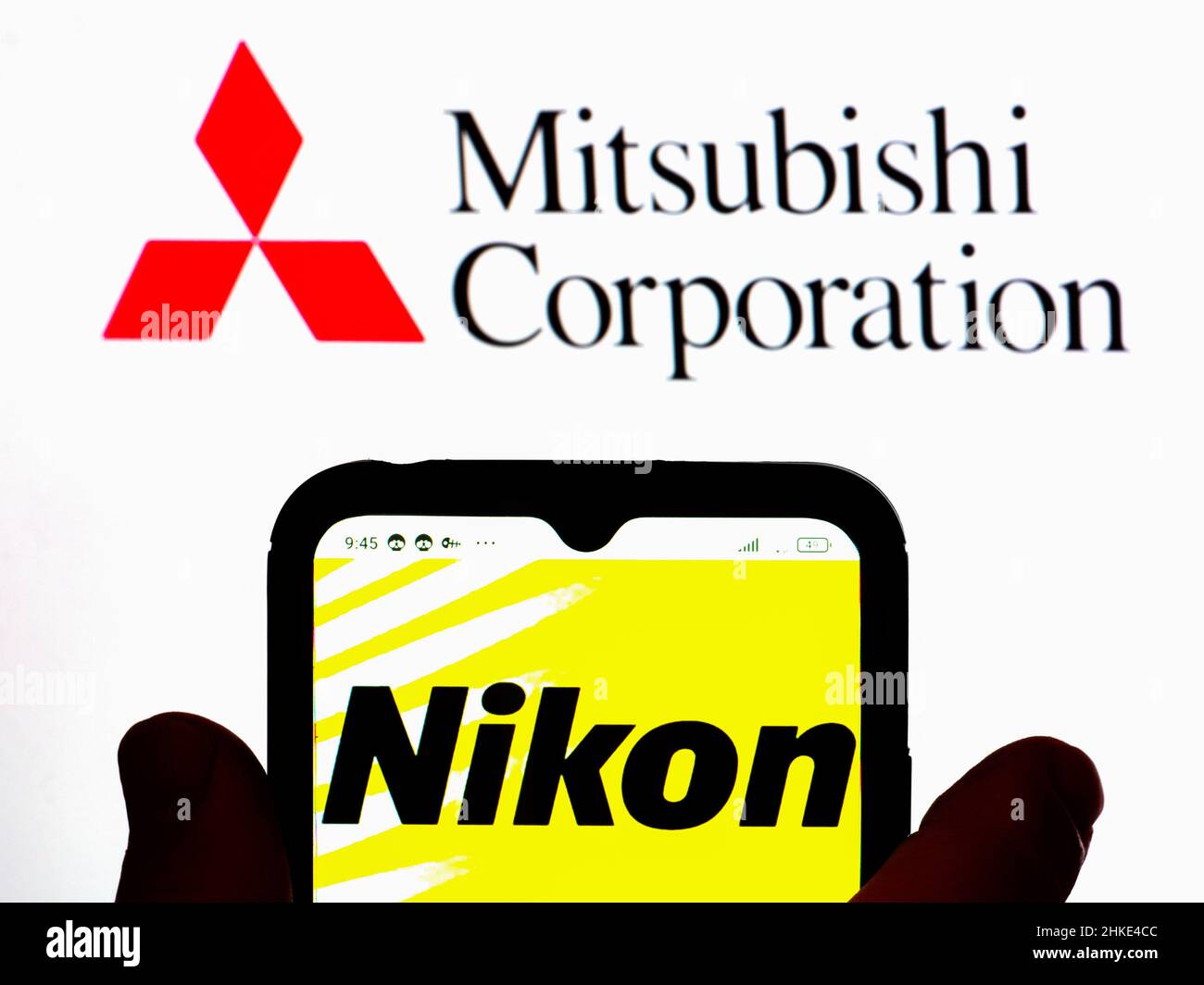 In this photo illustration, the Nikon logo is displayed on a smartphone  screen with a Mitsubishi Corporation logo in the background. (Photo by Igor  Golovniov / SOPA Images/Sipa USA Stock Photo -