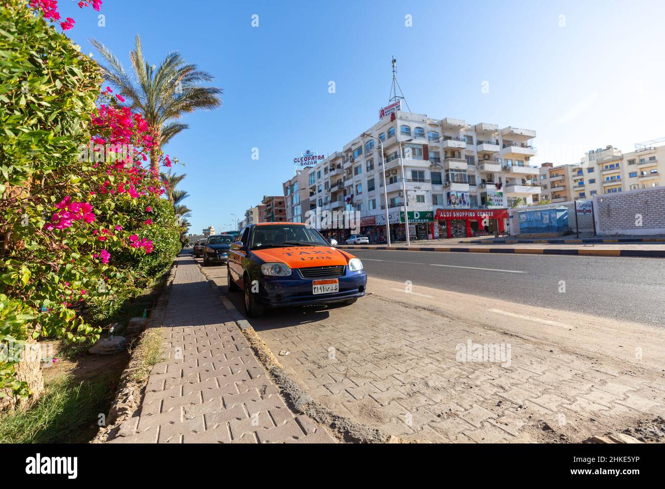 Hurghada, Egypt - January 22, 2022: Taxi cab stands on a street in Hurghada, Egypt. Stock Photo