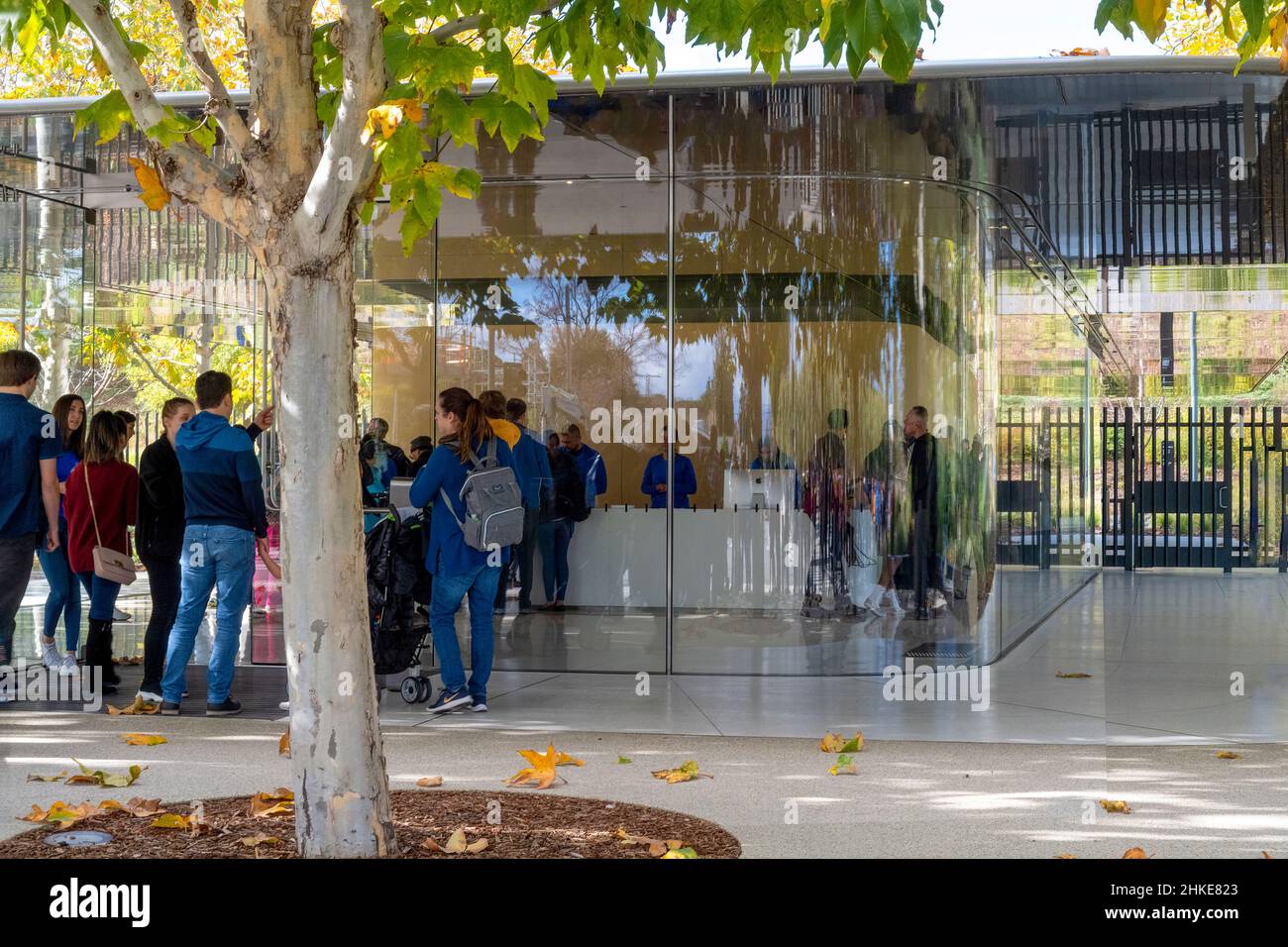 Cupertino, CA, United States - December 14, 2019: Employees and guests at reception entrance of Apple Inc. offices headquarters on Tantau Avenue in Si Stock Photo