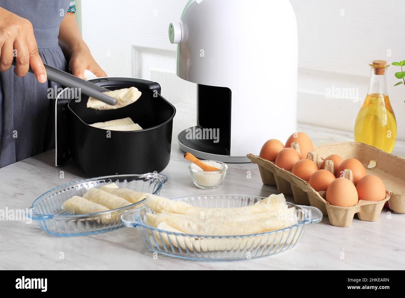 Cooking Proces Using White Air Fryer for Healthy Cooking in the Kitchen