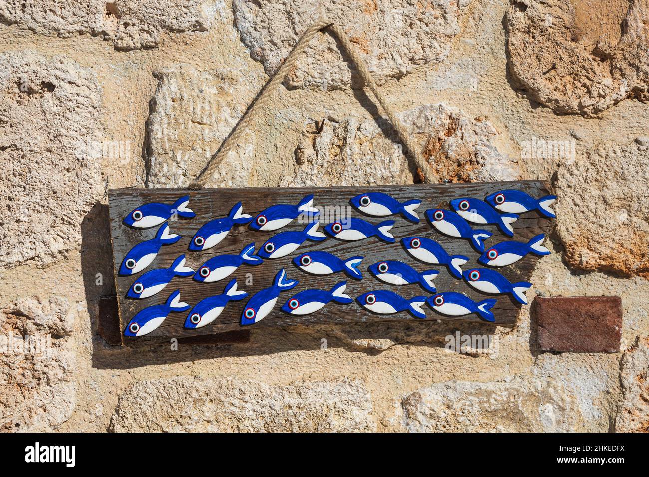 Colorful souvenir background. Hanging decoration in the market. Handmade  fish hanging on the tourist market. Sale of souvenirs. Funny handmade  fishes Stock Photo - Alamy